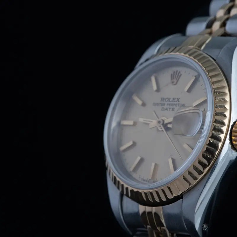 ROLEX Oyster Perpetual Date Automático Acero y oro Esfera Champane 56869 03