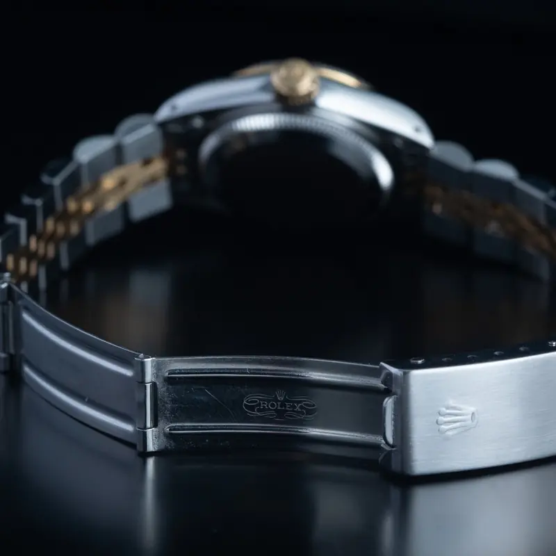 ROLEX Oyster Perpetual Date Automático Acero y oro Esfera Champane 56869 09